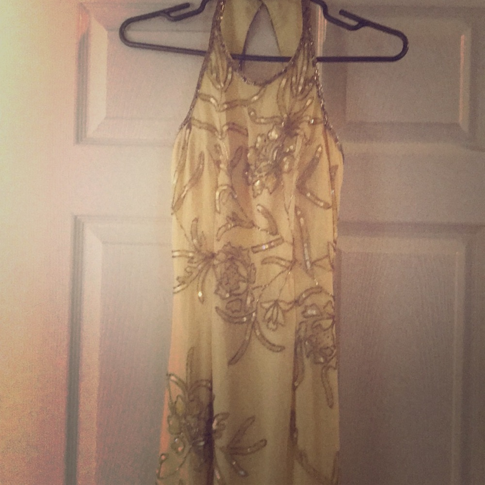 Open back, hand beaded gown.